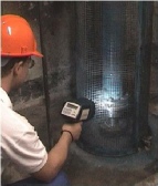 Stroboscopic viewing of rotating shaft to check nuts